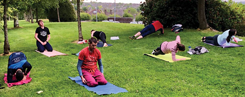 Outdoor yoga class Outdoor yoga class